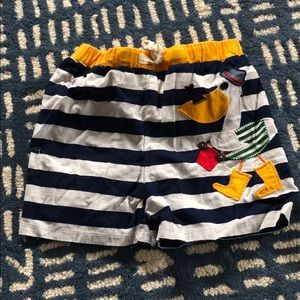Mud Pie baby swim trunks